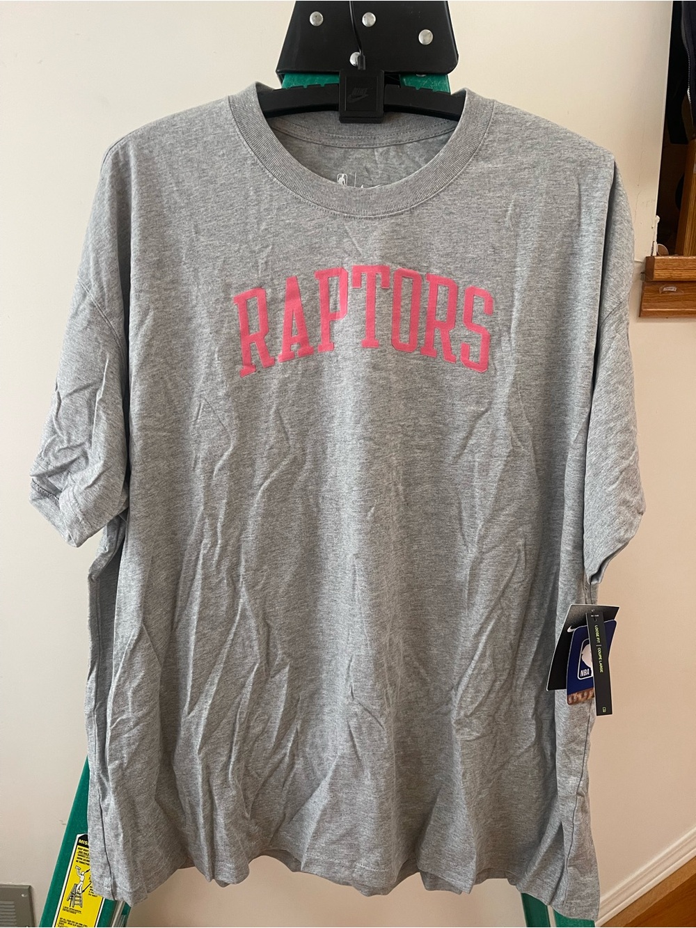 Nike NBA Grey T-Shirt with Pink Raptors Logo
